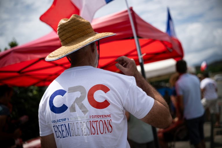 Un membre du Collectif Résistance citoyenne célèbre la fête de la citoyenneté dans le quartier Magenta à Nouméa, le 24 septembre 2024