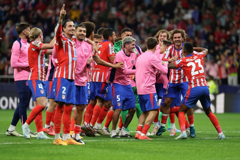 Les joueurs de l'Atletico Madrid célèbrent leur victoire 2-1 contre le RB Leipzig jeudi pour la première journée de Ligue des champions.