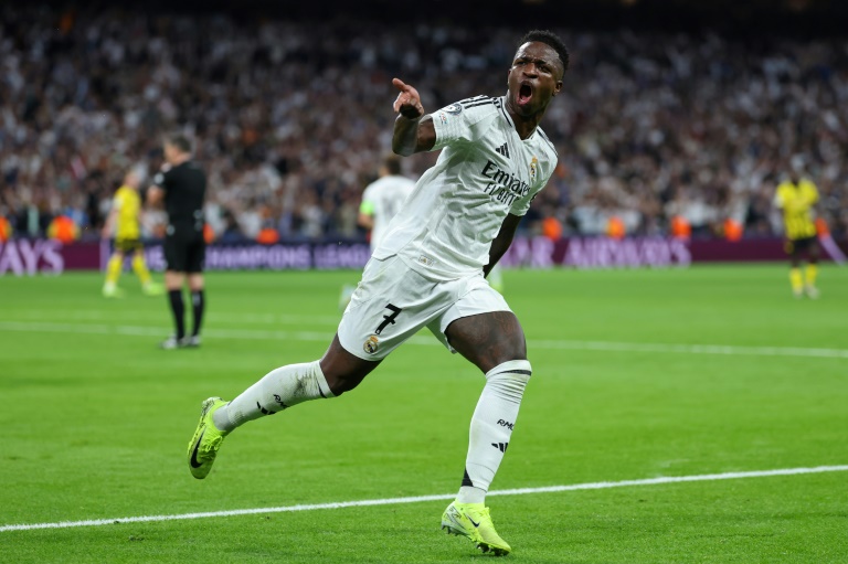 Le joueur du Real Madrid Vinicius Junior célèbre un but lors du match contre Dortmund lors de la Ligue des champions le 22 octobre 2024 à Madrid