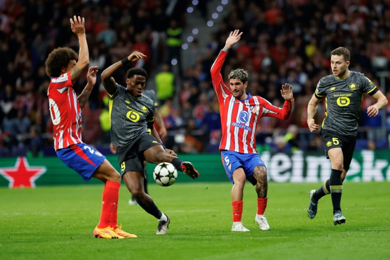 Le Canadien Jonathan David (c), double buteur pour Lille face à l'Atlético de Madrid (3-1), en phase de groupe de la Ligue des champions le 23 octobre 2024 à Madrid