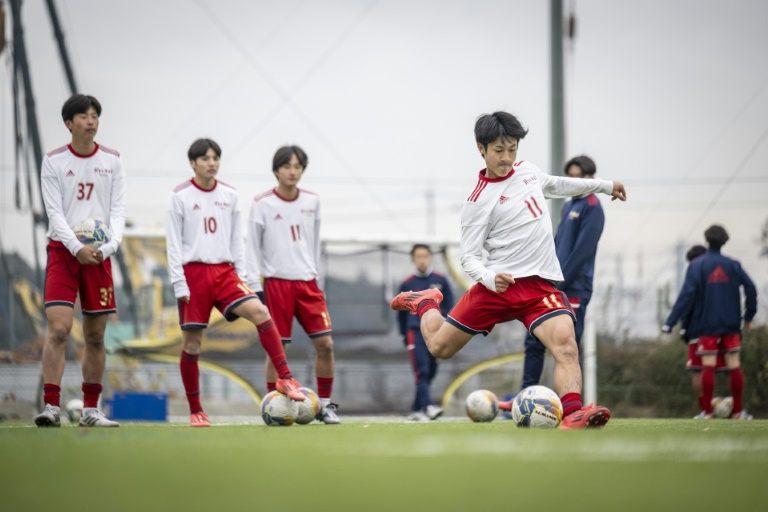 Ryutsukeizai University Kashiwa High School football club train for the annual tournament which is is thriving after more than 100 years, attracting huge crowds, millions watching on TV and breeding future stars